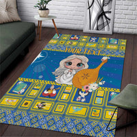 Blue Christmas area rug with yellow patterned border and angel holding a trumpet