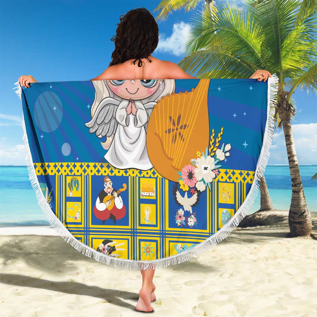 Round blue beach blanket with fringe edge and angel harp design, held open