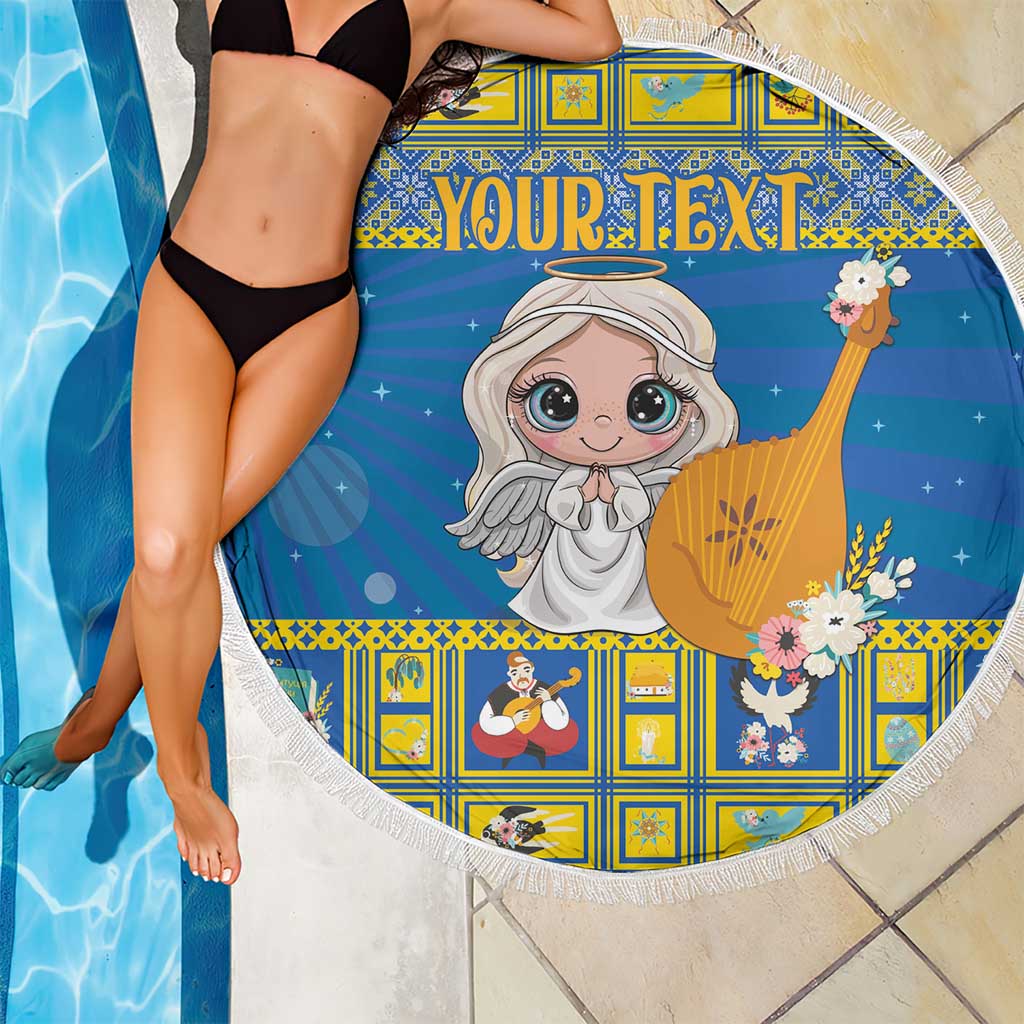 Round blue beach blanket with fringe border, angel harp artwork and 'YOUR TEXT' centerpiece