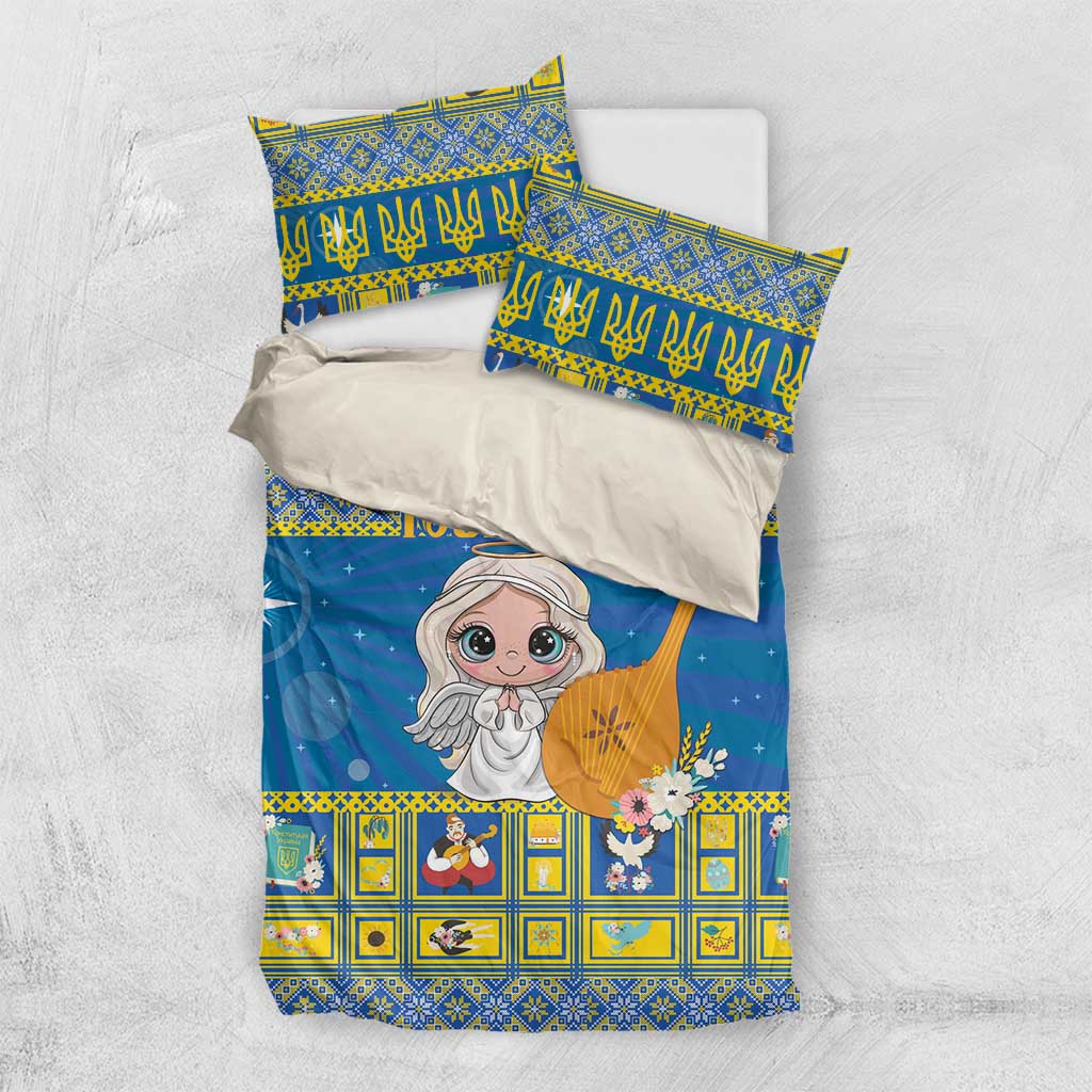 Blue bedding set with two pillow shams featuring angel artwork and yellow geometric frames
