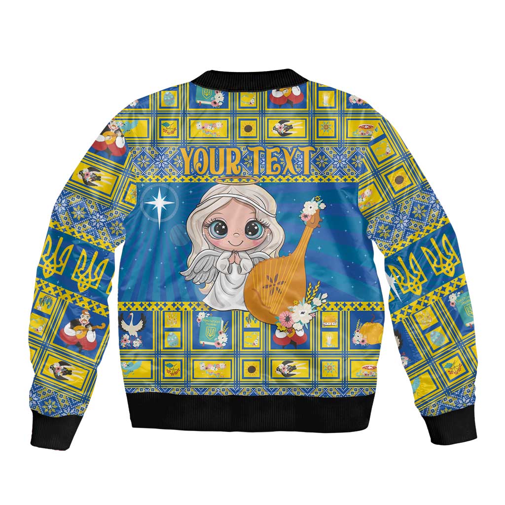 Unisex blue bomber jacket with angel holding harp, 'You're' text, black ribbed cuffs