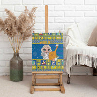 Personalized blue canvas wall art on wooden easel, angel holding harp with floral accents