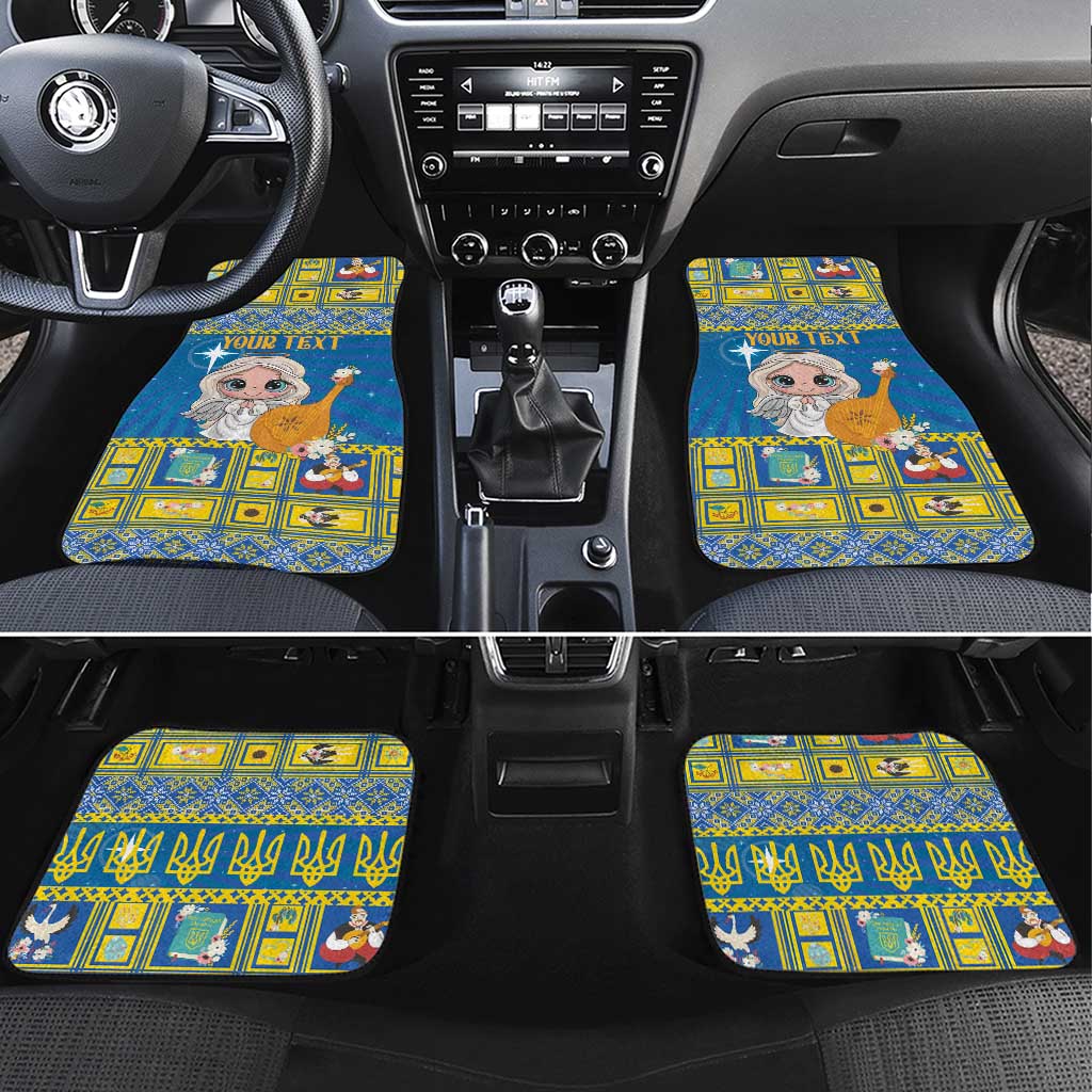 Blue car floor mats with angel graphic and “YOUR TEXT” banner on a patterned border