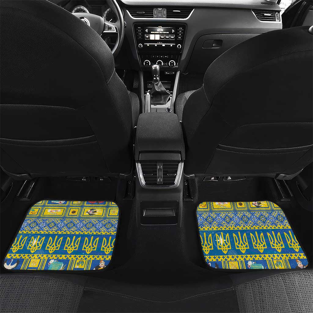 Blue rear car floor mats with angel pattern and yellow trident-style symbols