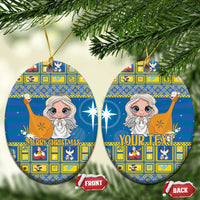 Blue ceramic Christmas ornament, oval shape with angel artwork and “Merry Christmas”/“Your Text,” gold loop