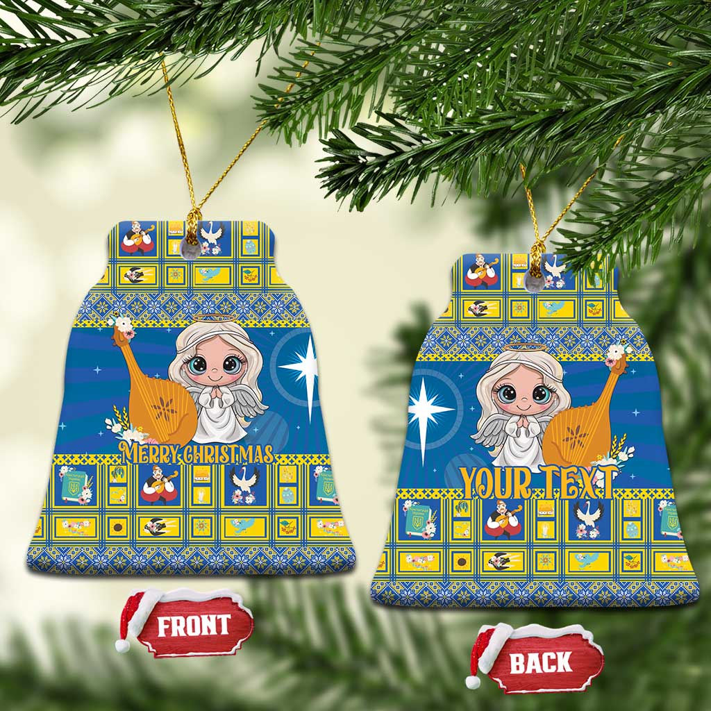 Blue ceramic Christmas ornament, bell shape with angel artwork, gold hanging loop and front/back tags