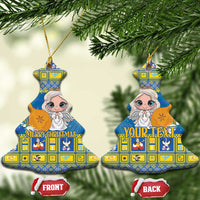 Blue ceramic Christmas ornament, tree shape with angel artwork, gold hanging loop and front/back tags