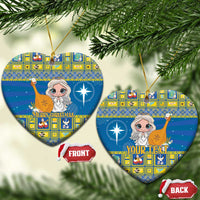 Blue ceramic Christmas ornament, heart shape with angel artwork, gold hanging loop and front/back tags