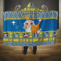Blue hooded blanket with star-and-angel illustration and festive border pattern, full cover
