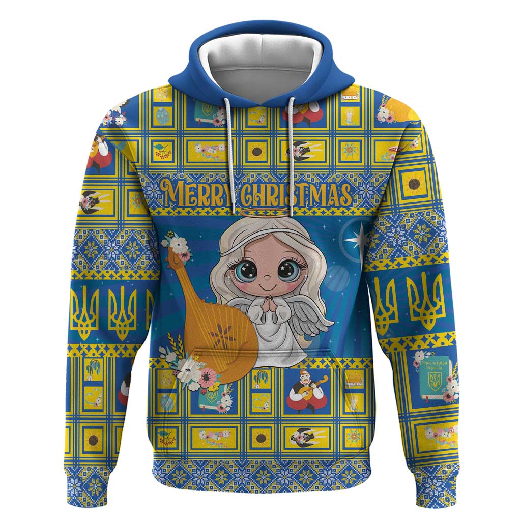 Blue pullover hoodie with colorful Christmas angel cartoon and festive pattern, front view.