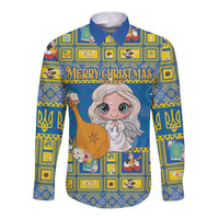 Blue long-sleeve button shirt with colorful festive angel and “Merry Christmas” print