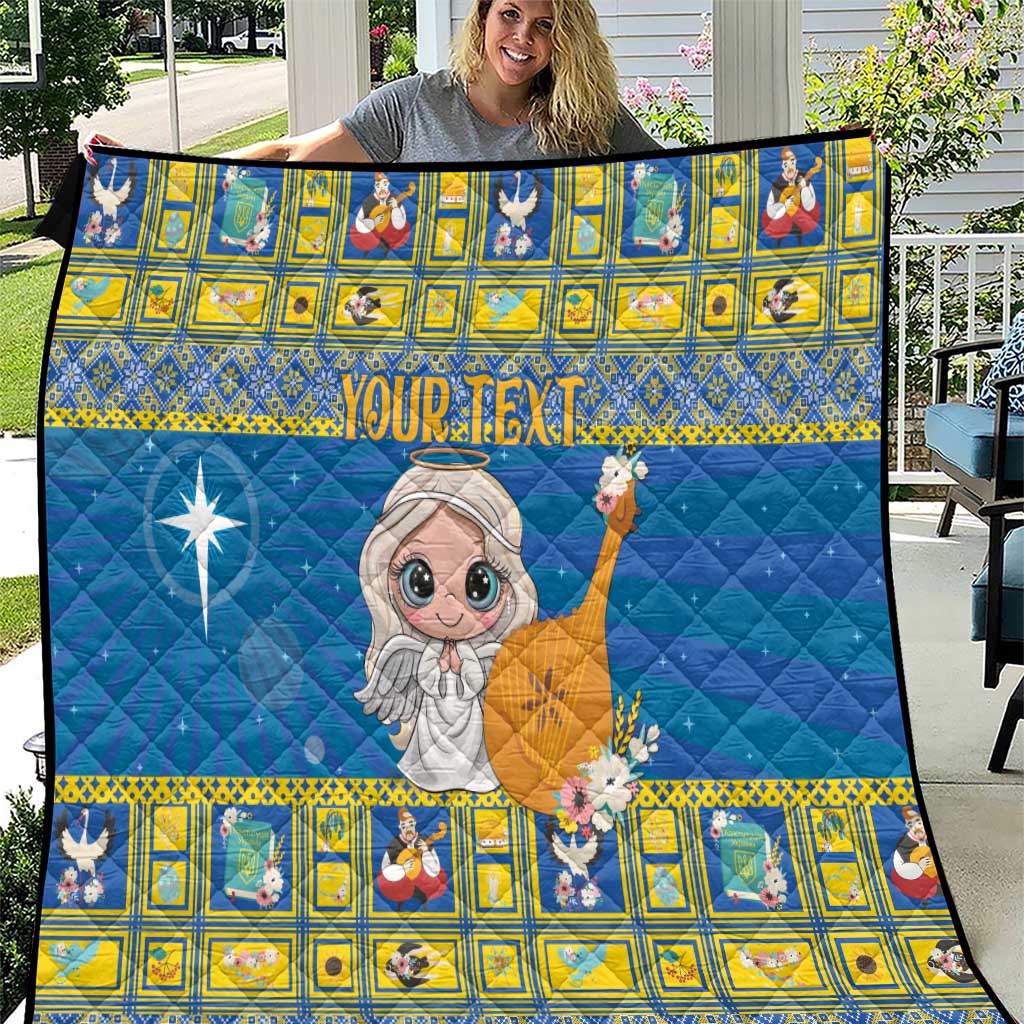 Personalized blue quilt with yellow border, angel star-of-Bethlehem graphic and custom text