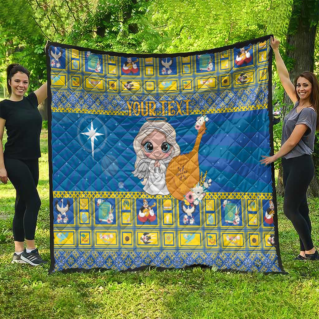 Personalized blue quilt with yellow border, angel graphic and custom text strip