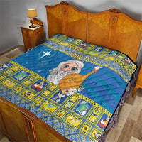 Personalized blue quilt on bed, angel holding star wand and yellow patterned border