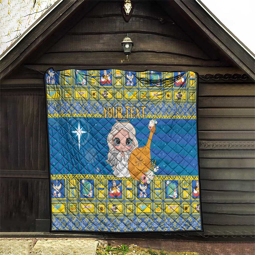 Personalized blue quilt on outdoor wall, star wand angel and yellow patterned border