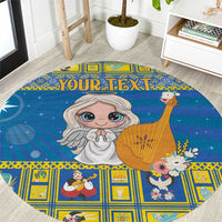Blue round Christmas carpet with angel, nativity icons, and custom text design