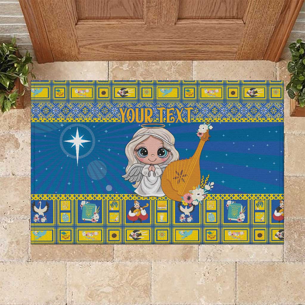 Personalized blue rubber doormat with cartoon angel, Bethlehem star, and “YOUR TEXT”