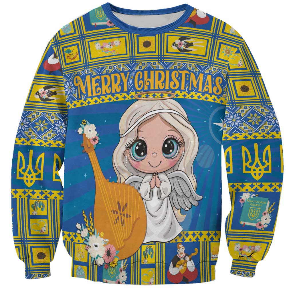 Unisex blue Christmas sweatshirt with angel graphic and “Merry Christmas” text