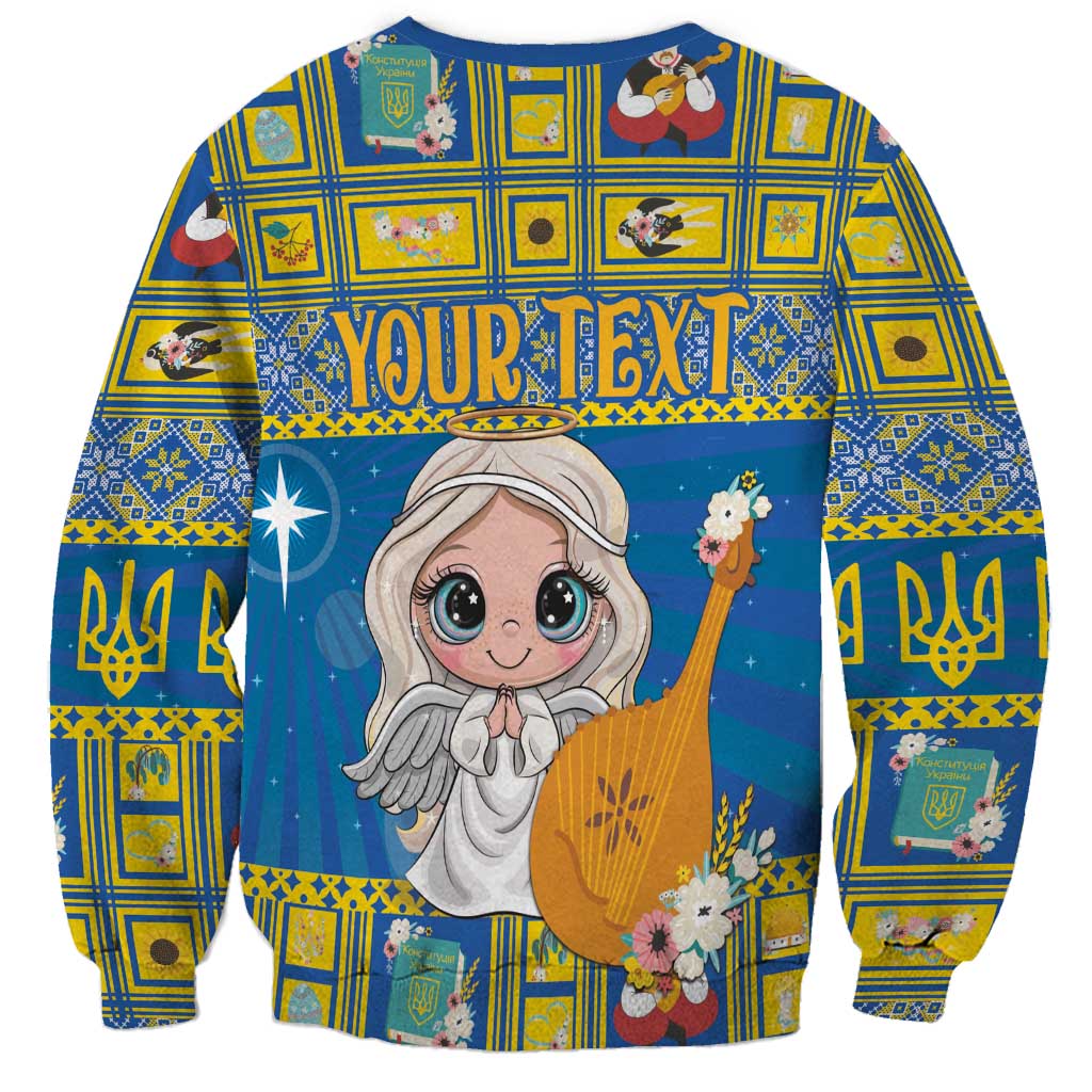 Unisex blue Christmas sweatshirt with smiling angel and “YOUR TEXT” headline