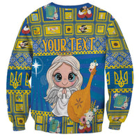 Unisex blue Christmas sweatshirt with smiling angel and “YOUR TEXT” headline