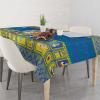 Blue patterned Christmas tablecloth with Bethlehem star, covering dining table