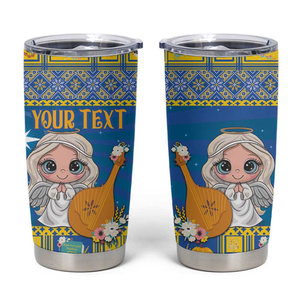 Blue personalized Christmas tumbler with angel graphic and 'YOUR TEXT' on front