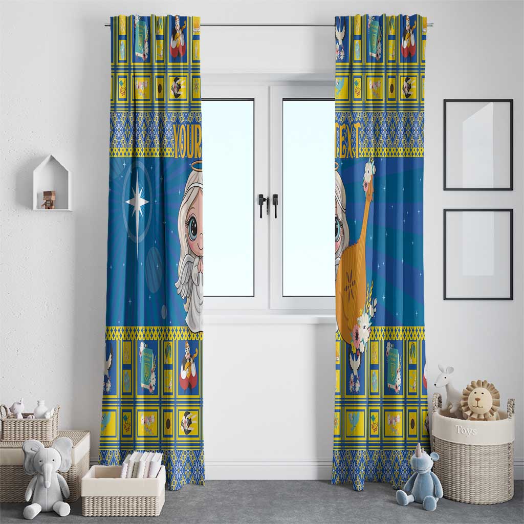 Pair of blue patterned window curtains with angel and star motifs and yellow checker border