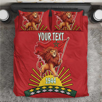 Red bedding set with lion flag graphic, “YOUR TEXT” and “1944” on duvet and pillows.