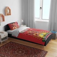 Red duvet with lion holding flag graphic, “YOUR TEXT” text, and “1944” on bed.