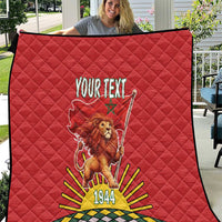 Red quilt with lion holding a flag, personalized 'YOUR TEXT', and 1944 design