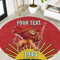 Round red rug with lion holding flag graphic, 'YOUR TEXT' and '1944' print