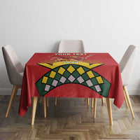 Red personalized tablecloth with lion and flag 1944 design on dining table