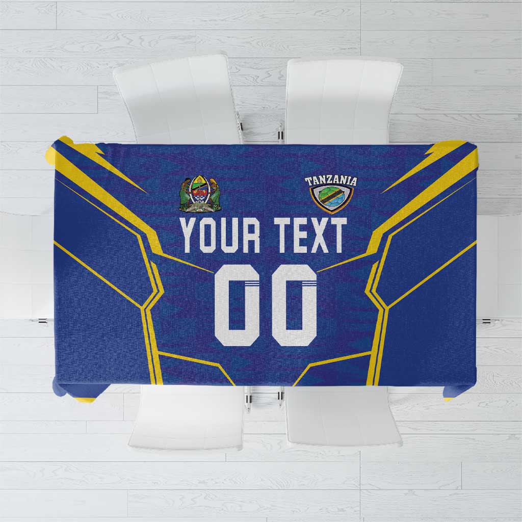 Blue and yellow football-themed custom tablecloth with Tanzania crest, YOUR TEXT, and 00.
