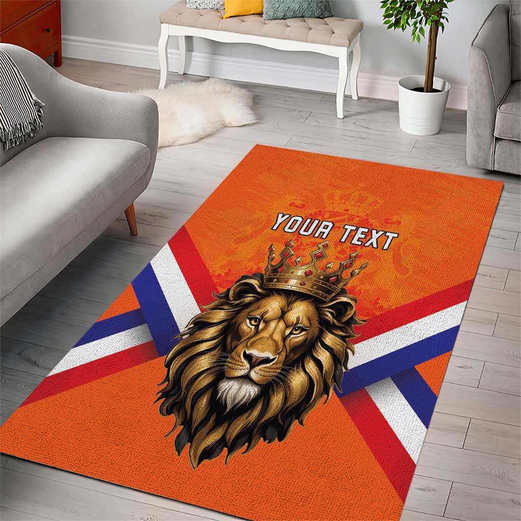 Orange area rug featuring a crowned lion head, Union Jack pattern, and 'YOUR TEXT'