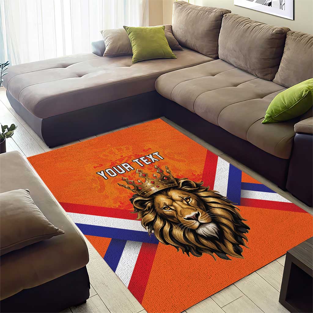 Orange area rug with crowned lion face, Union Jack stripes, and custom 'YOUR TEXT'