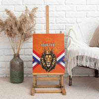 Canvas wall art with crowned lion head, orange background, and “YOUR TEXT” design