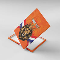 Orange canvas wall art with crowned lion head and “YOUR TEXT” on flag-stripe background