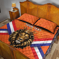 Orange quilt bed set with lion crown artwork, YOUR TEXT text, flag stripes, two quilted pillows