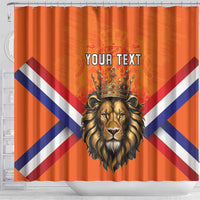 Orange shower curtain with crowned lion head, Union Jack stripes, and 'Your Text'.
