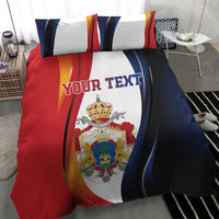 Personalized bedding set duvet and pillows with red, blue, and white crest and 'YOUR TEXT'