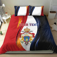 Personalized bedding set with red, blue, and white duvet cover showing crest and 'YOUR TEXT'