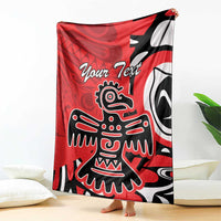 Red personalized blanket draped on floor, eagle totem graphic with "Your Text" visible