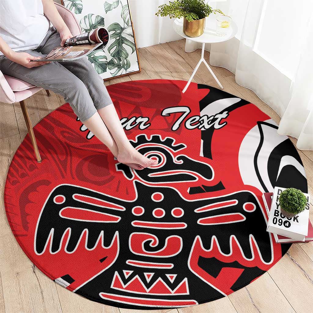 Red round rug with eagle design and 'Your Text' script, black and white tribal shapes.