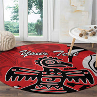 Red round rug featuring eagle face and 'Your Text' script, black and white geometric lines.