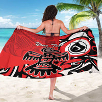 Red and black patterned sarong with 'Your Text' eagle-style graphic, draped