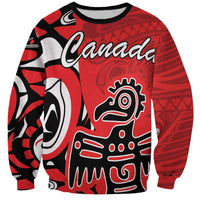 Red sweatshirt with black-and-white Haida-style eagle and 'Canada' script front print
