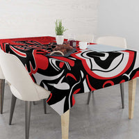 Red, black, and white tablecloth with large eagle motif and geometric details