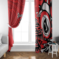 Red window curtain panels with black-and-white eagle artwork and personalized script text near a door.