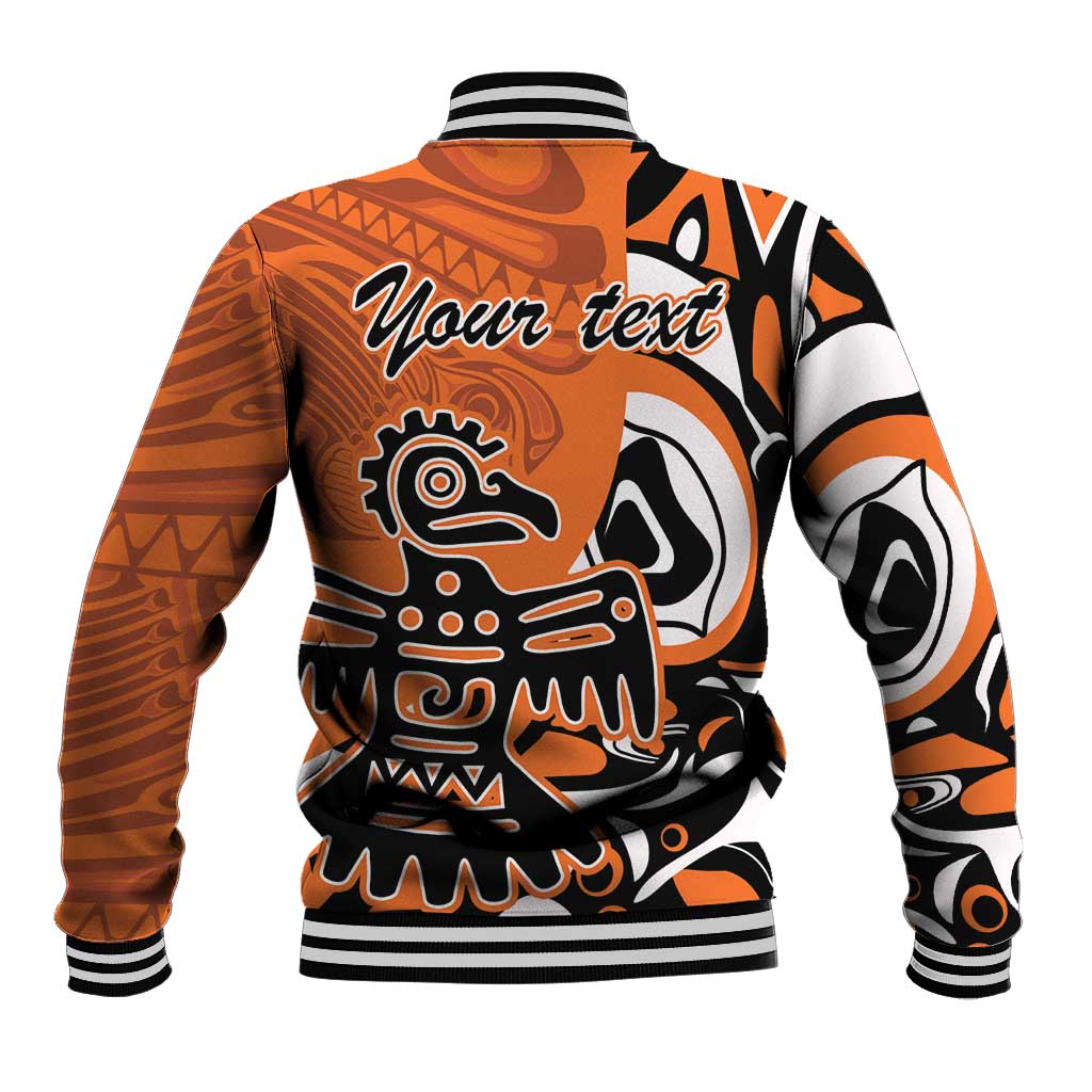 Orange baseball jacket with black and white Haida eagle back graphic, ribbed cuffs