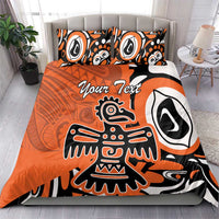 Orange eagle-themed bedding set with black and white tribal graphics and two matching pillows